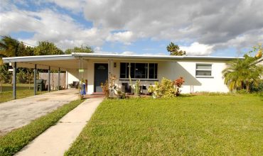 This modern 2-bedroom plus den, 1-bath home